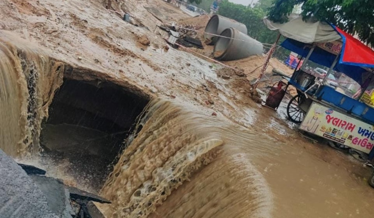 A road that collapsed in Gujarat following heavy rains